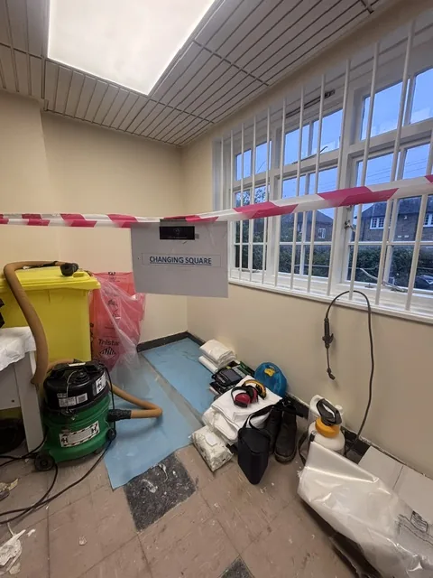 Asbestos floor tile and bitumen removal in Hither Green